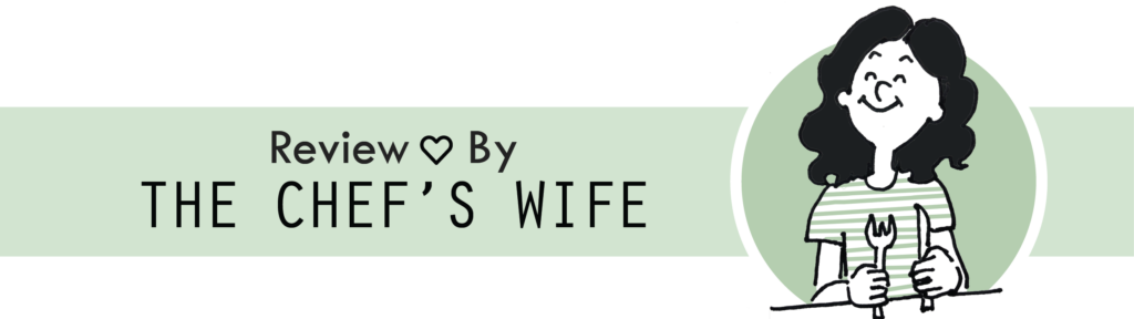 Banner with "Review by the chef's wife" text and an illustration of a happy person in a striped t shirt holding a knife and fork