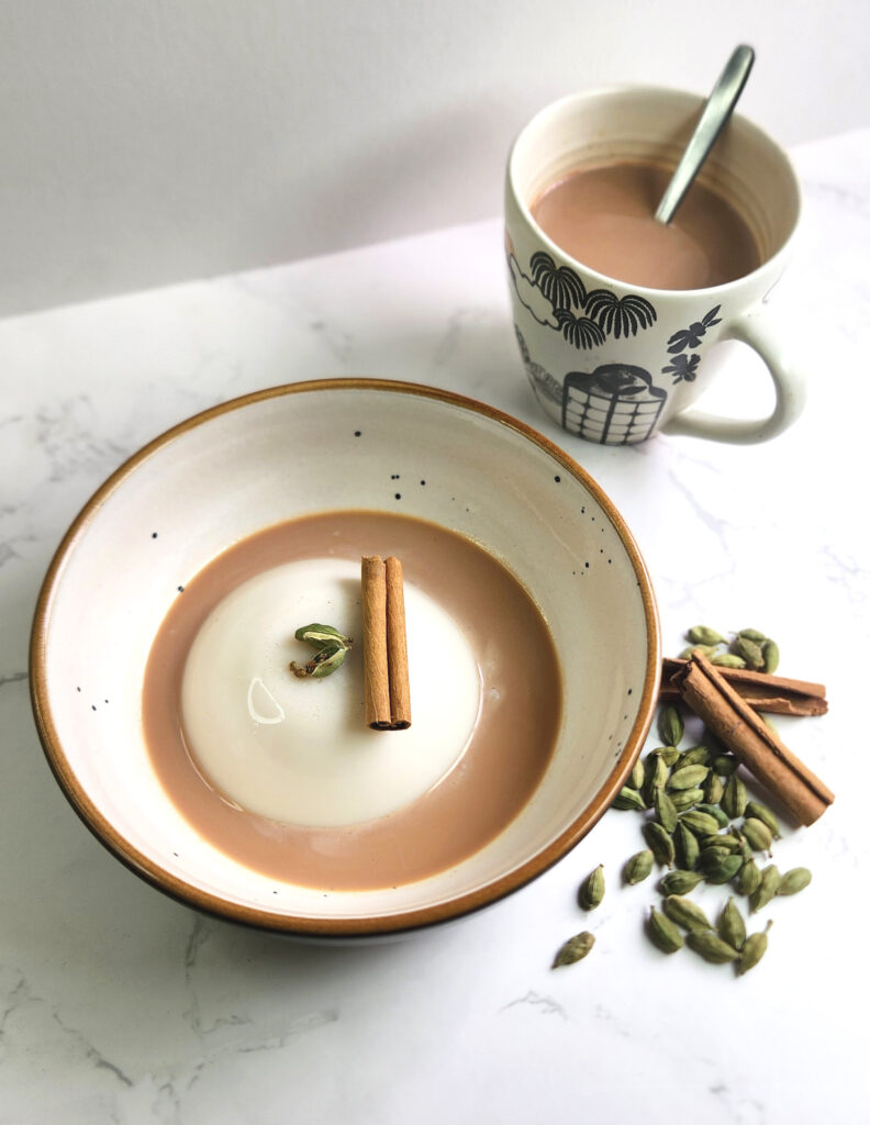 Vanilla Chai spiced pannacotta in a bowl with chai sauce