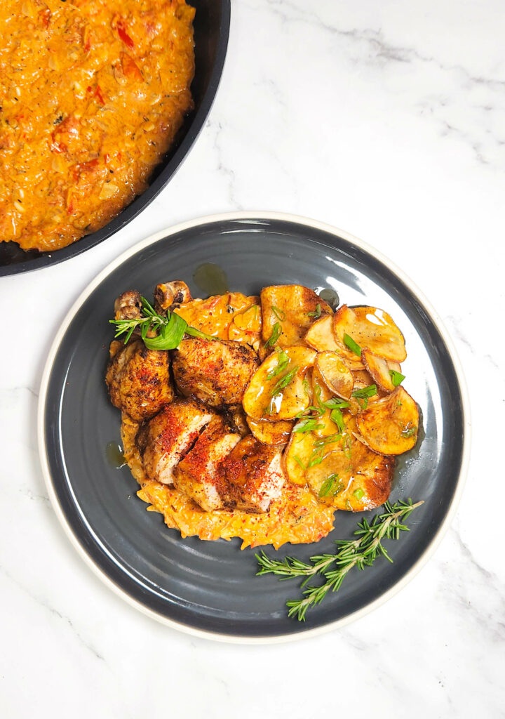 Married me chicken, roast chicken with a tomato and cream based sauce, honey butter chips and rosemary