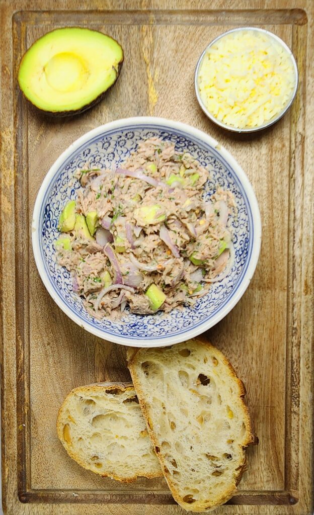 tuna melt mix with mayo, cheese and avocado, sourdough slices