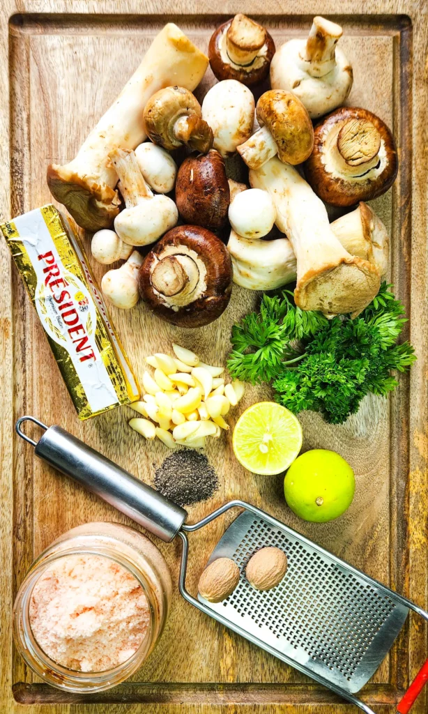 Garlic Butter Mushrooms ingredients - assorted mushrooms, parsley, butter, lime, garlic, black pepper, salt and nutmeg