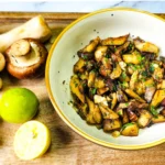 Garlic Butter Mushrooms in a plate with parsley on top, assorted mushrooms, lime and nutmeg