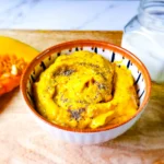 creamy mashed pumpkin Purée with pumpkin, cream, and black pepper