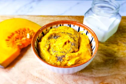 creamy mashed pumpkin Purée with pumpkin, cream, and black pepper