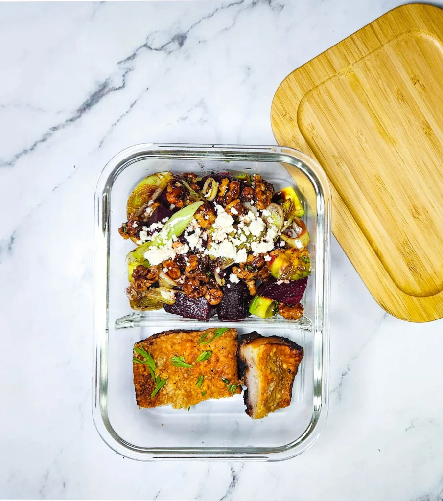 beetroot and feta salad with candied walnuts and balsamic glaze with Chinese crispy pork belly in a lunchbox